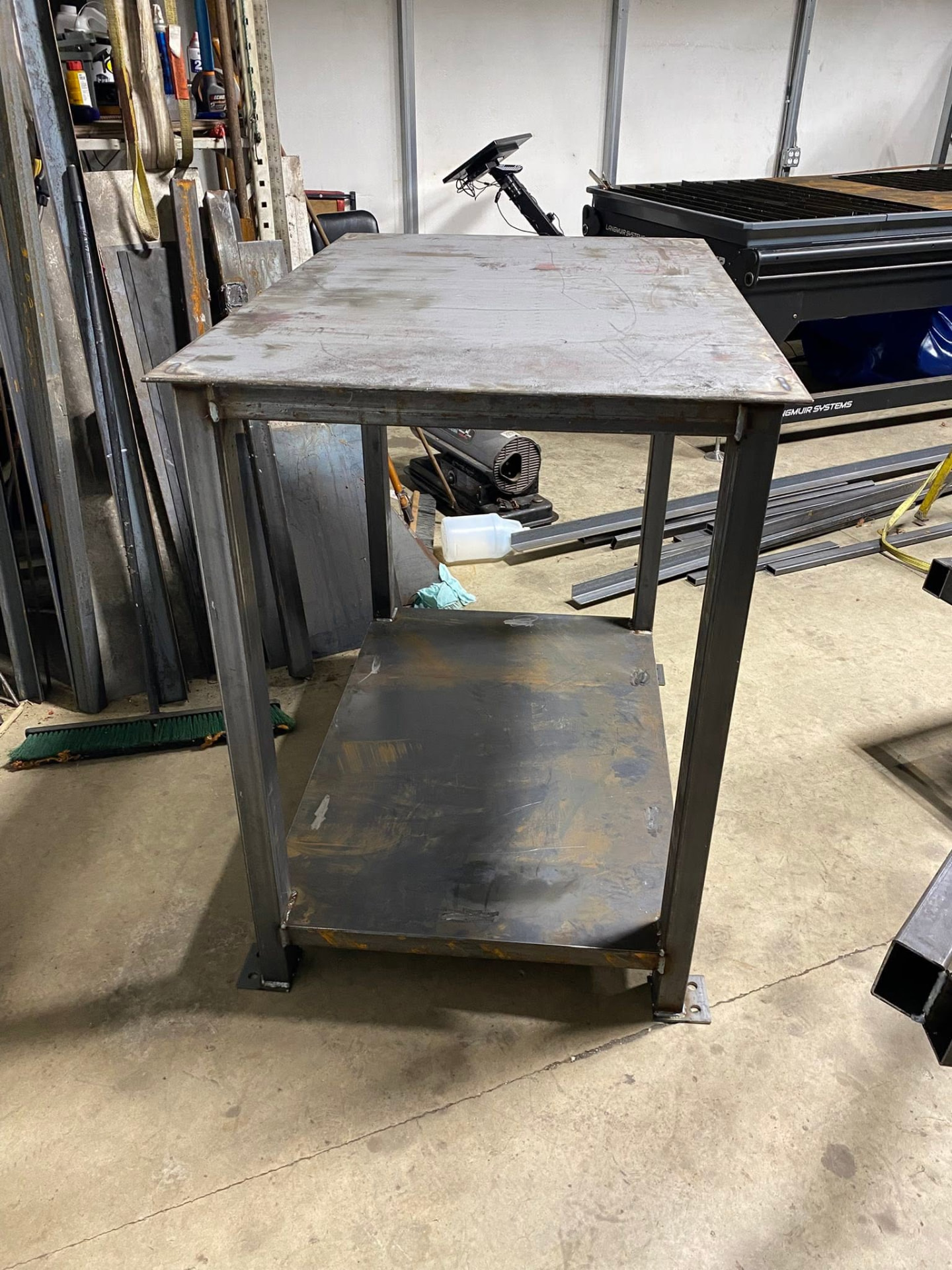 Heavy duty two-tier steel welding work table built in shop