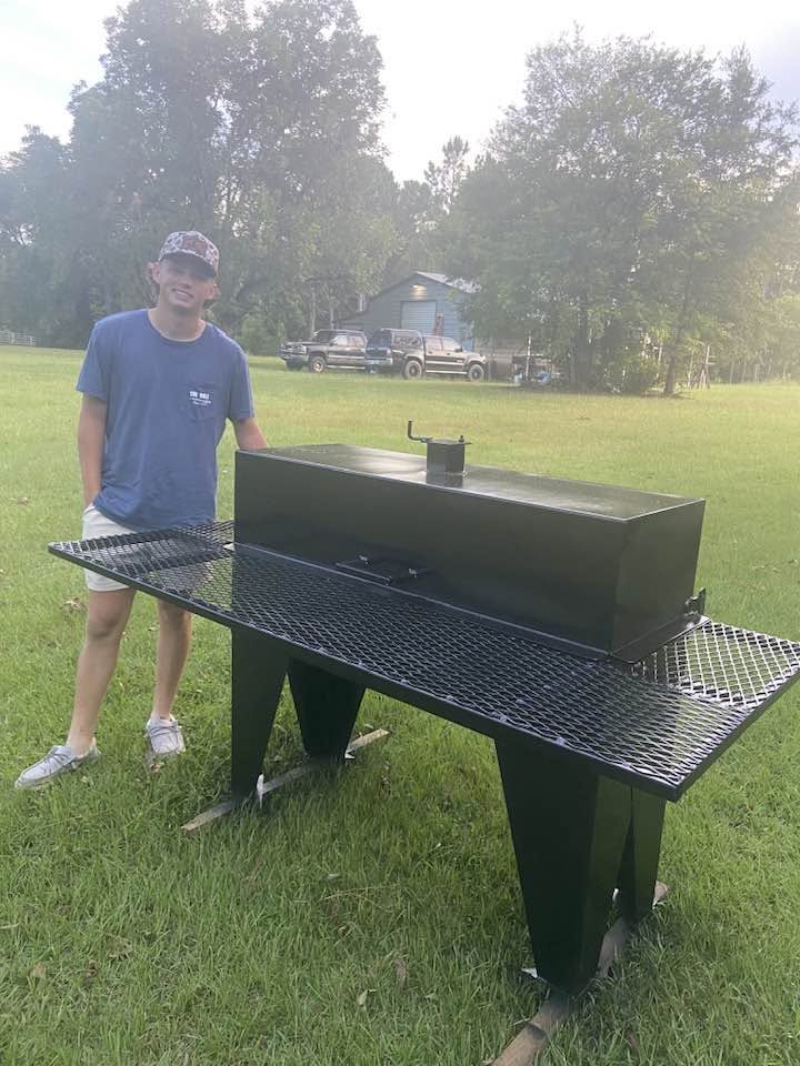 Custom fabricated steel grill with expanded metal shelves