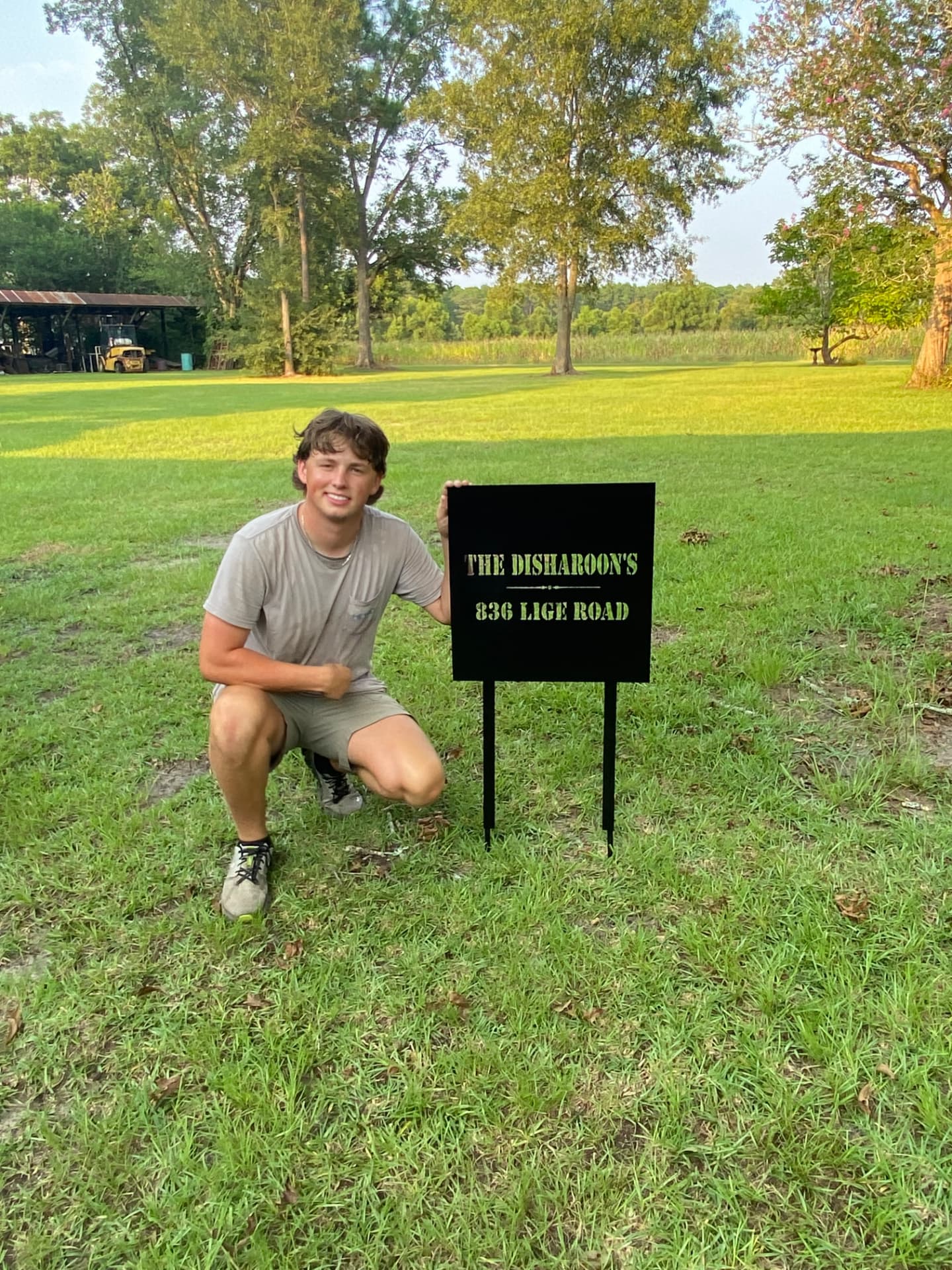 The Disharoon's 836 Lige Road plasma-cut address yard sign