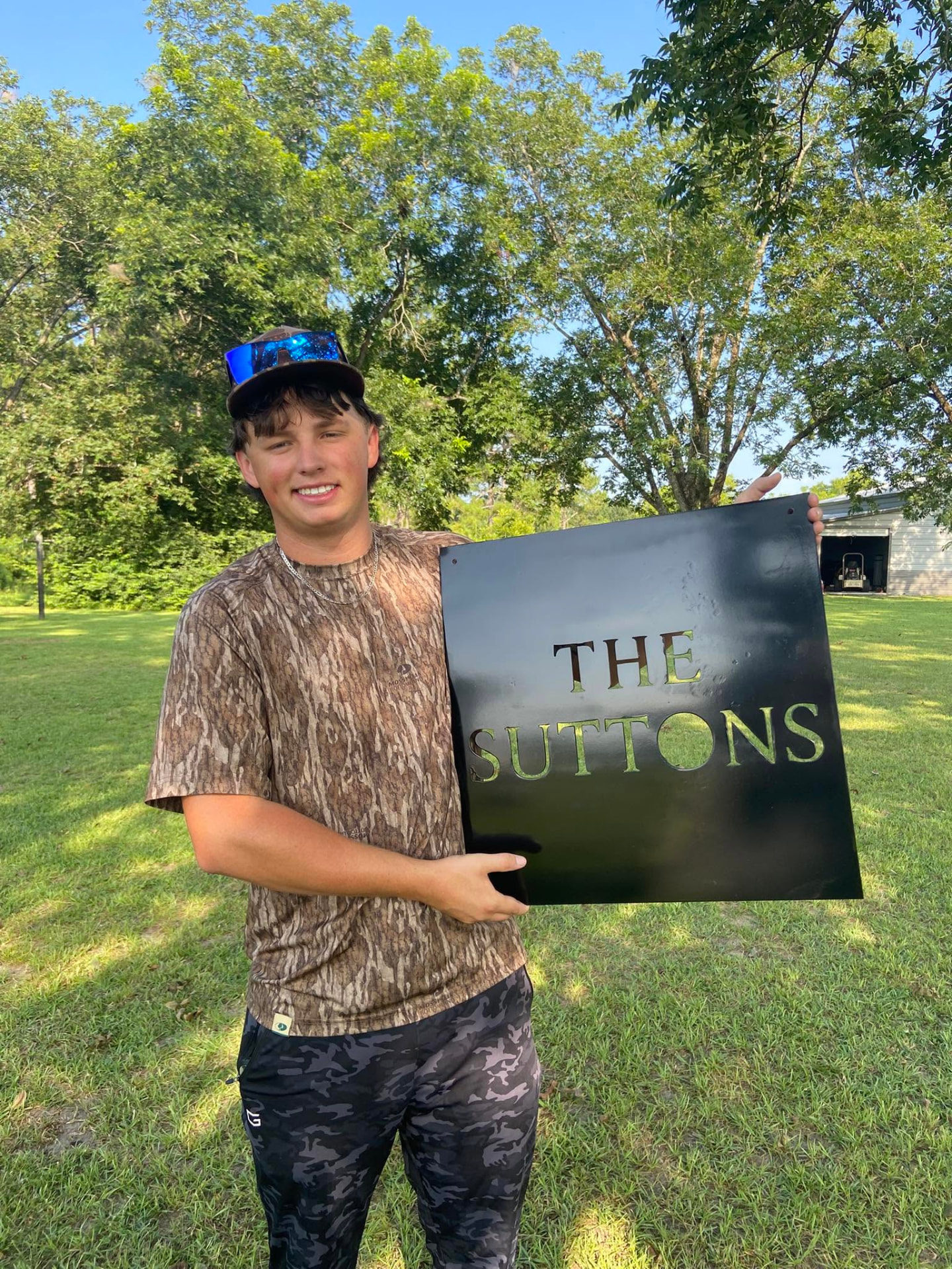 The Suttons plasma-cut steel name plate