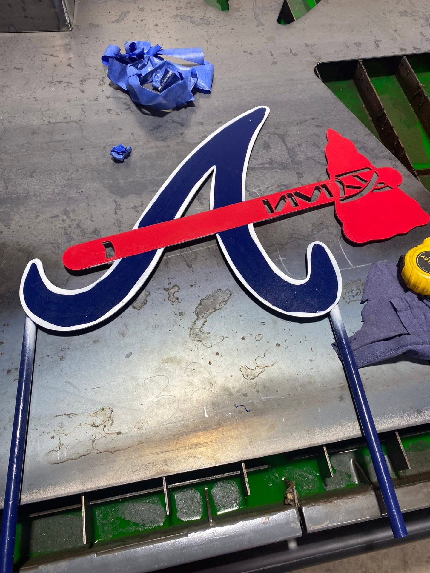 Plasma-cut and painted baseball team logo yard sign on steel stakes